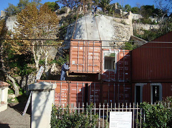 house made with 15 shipping containers