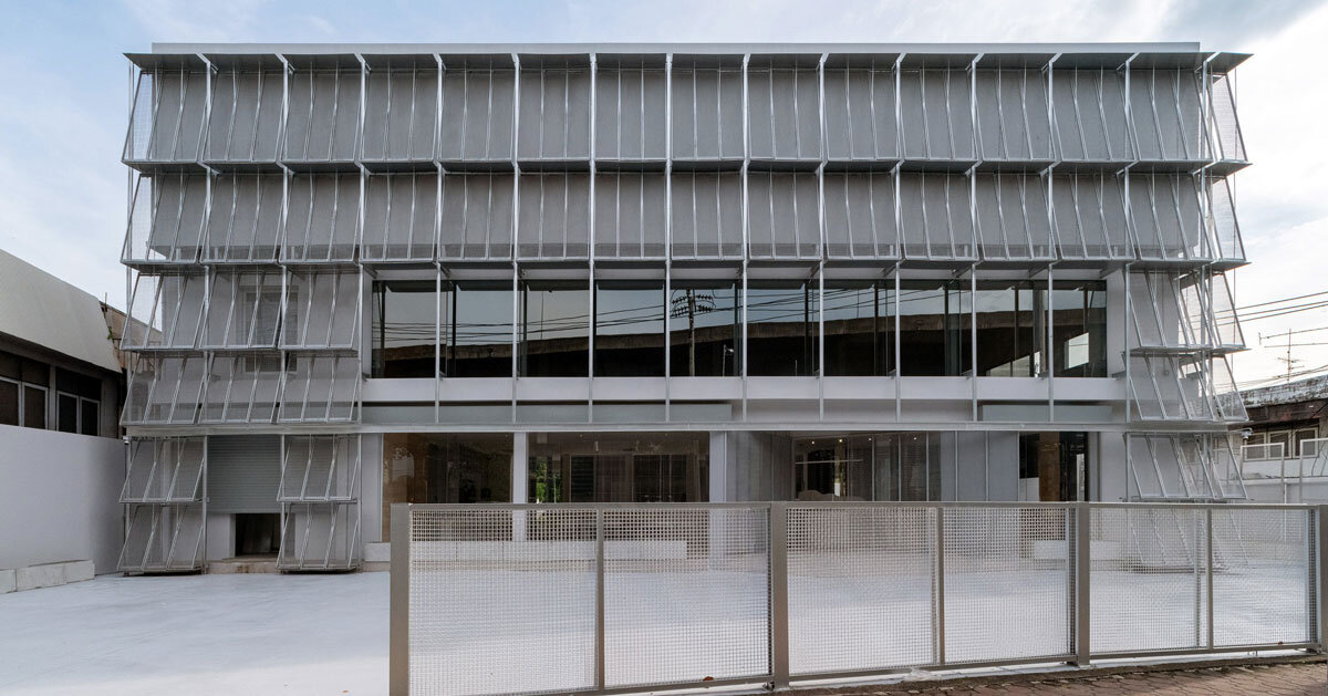 archive auto by PHTAA unfolds angled mesh panel facade in bangkok