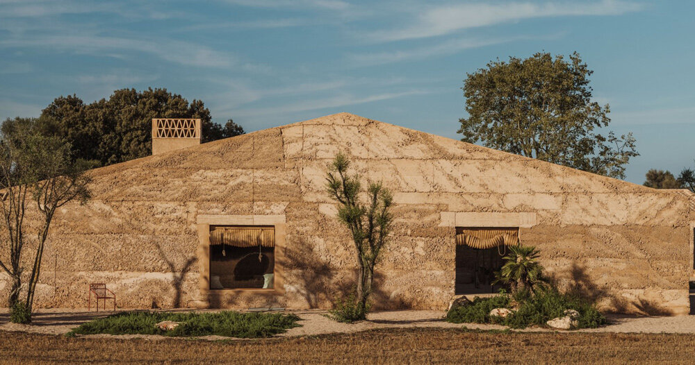 spanish studio munarq builds mallorca home ‘ca na pau’ from blocks of raw earth