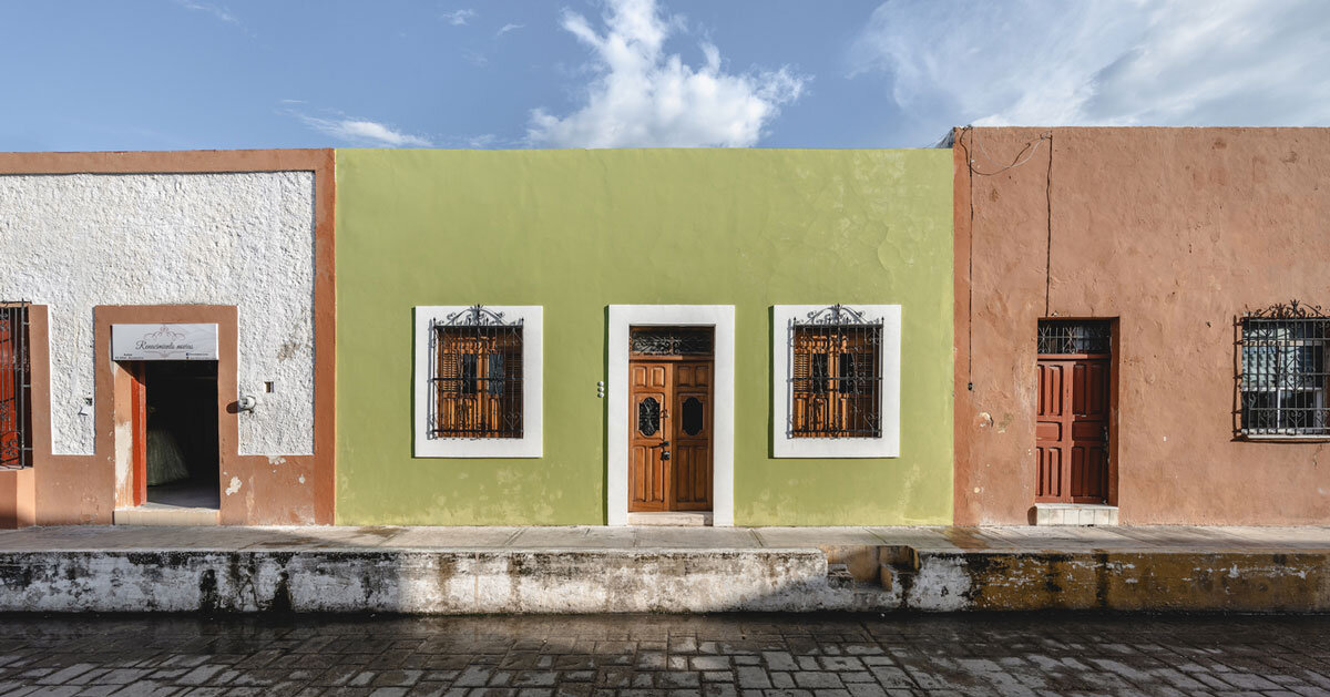 casa verde stands out in bright green facade after renovation by richaud arquitectura