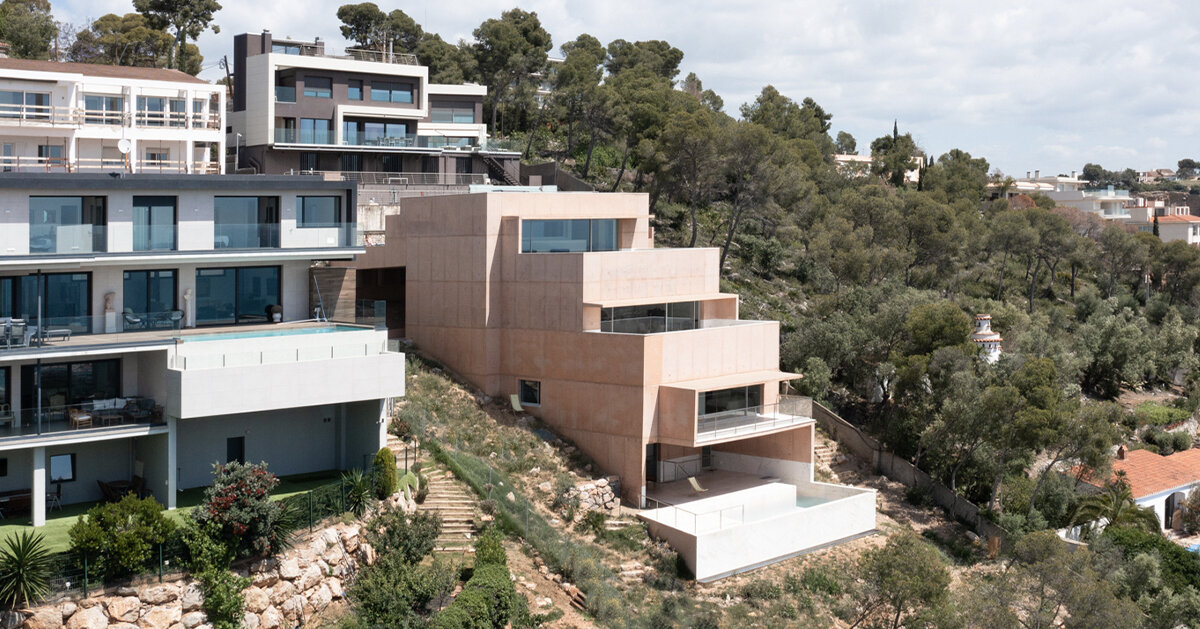 pedro cardigo captures alvaro siza’s casa colien, a stepped concrete volume in hilly barcelona