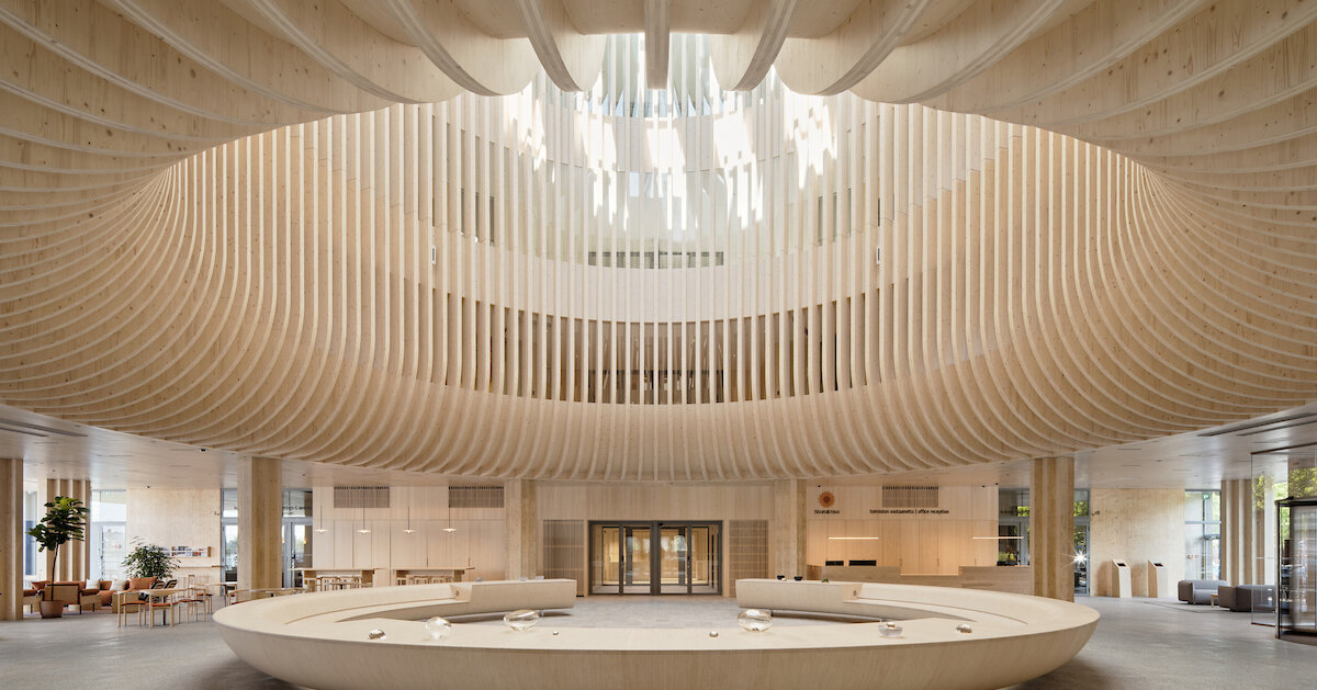 katajanokan laituri landmark in helsinki greets visitors with a cascading wooden skylight