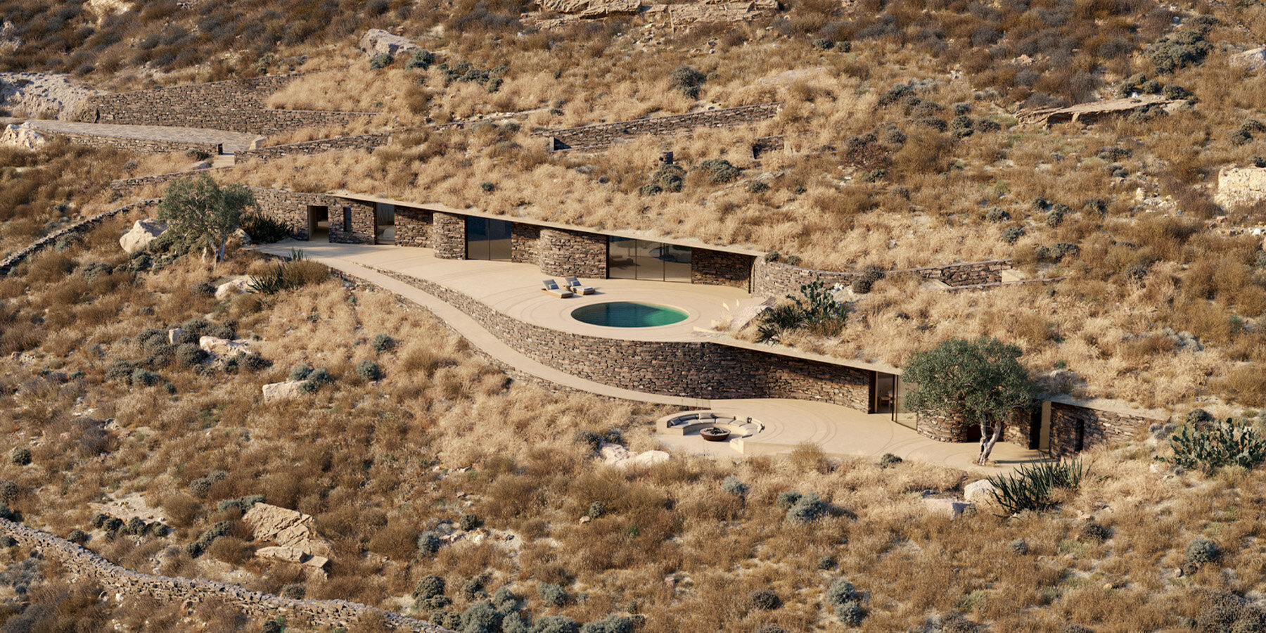 stone&clad rhoēs villa by sinas architects emerges like water ripples on serifos island