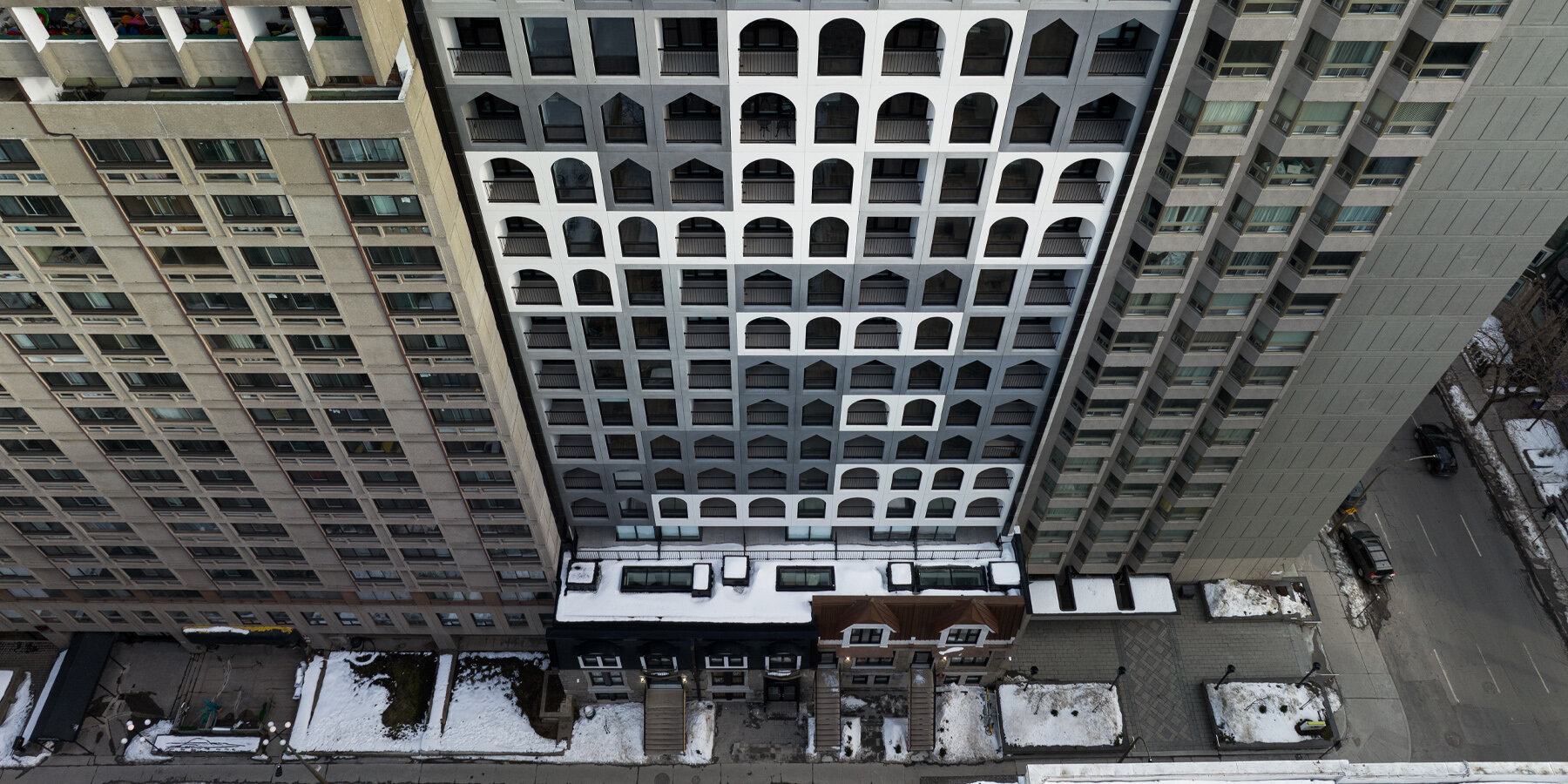 ACDF architecture fronts LINK tower in montréal with matrix of dormer archetypes