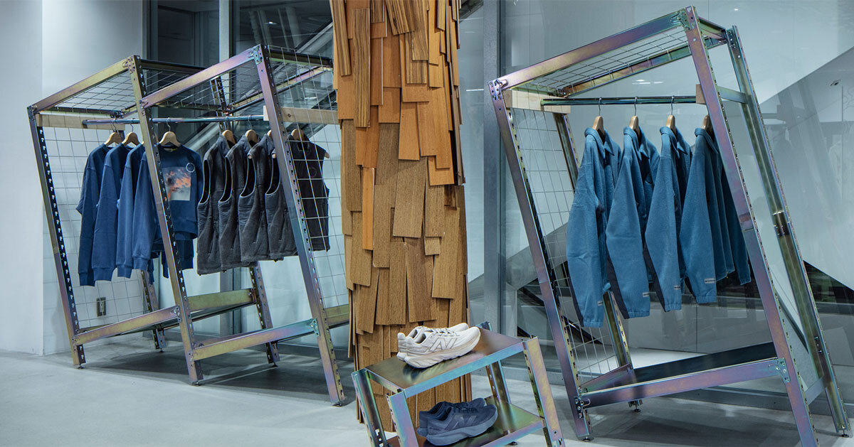 ATELIER WRITE repurposes steel racks into clothing stands for new balance’s retail dispay