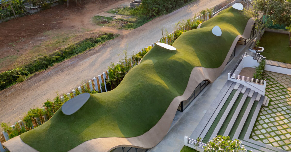 undulating green roof conceals cocoon pre&primary school in india mimicking a hillside