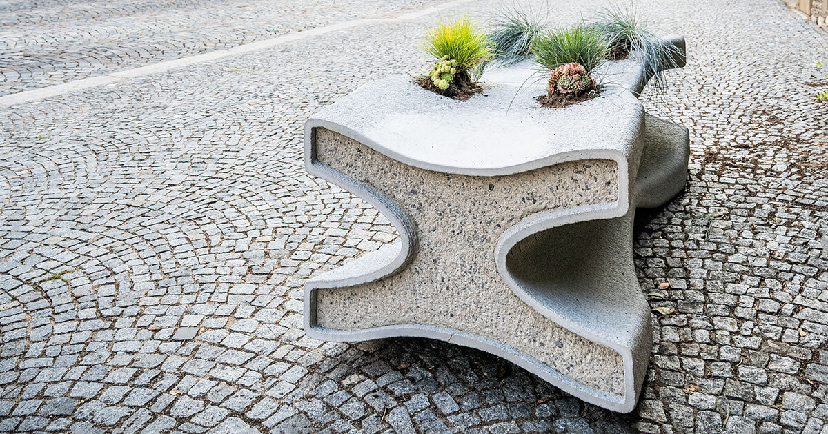 concrete bench X doubles as a planter, reflecting czech republic’s gothic heritage