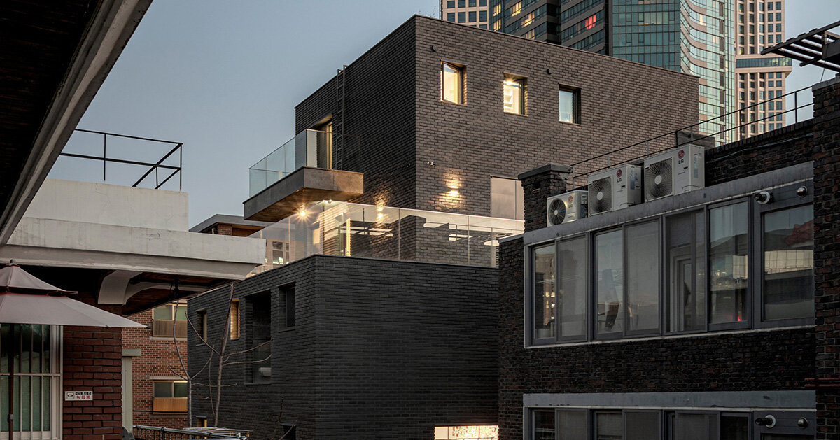 gray brickwork envelops curved ‘S gallery’ residence near seoul forest