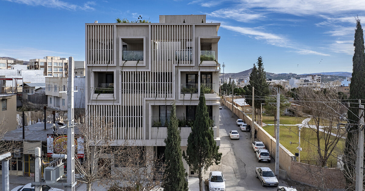 perforated brick facade by mohat office brings texture to iran’s residential skyline