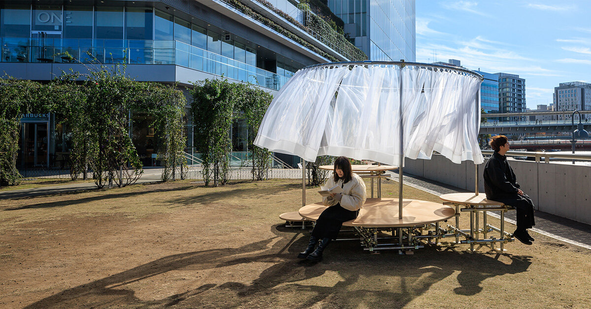 wind and light flow through organdie curtains of icai architects’ street furniture in japan