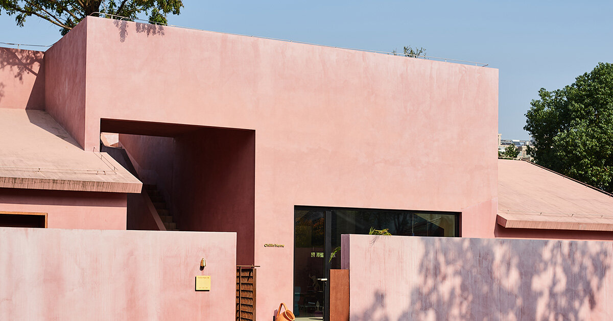 cherry blossom pink cement coats cultural space by qicang design in china