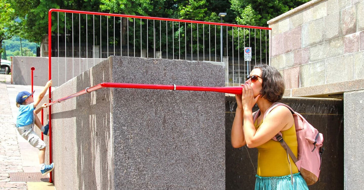 playful red tubes form moradavaga’s interactive sound installation at italian fire station