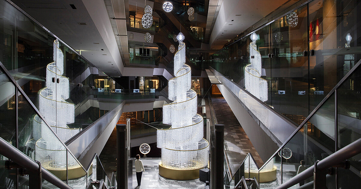 spiral christmas tree by yuji okitsu illuminates tadao ando’s japanese commercial complex