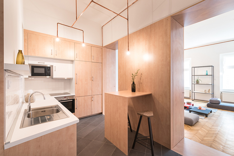 copper and home: batlab remodels house with web-lights in budapest