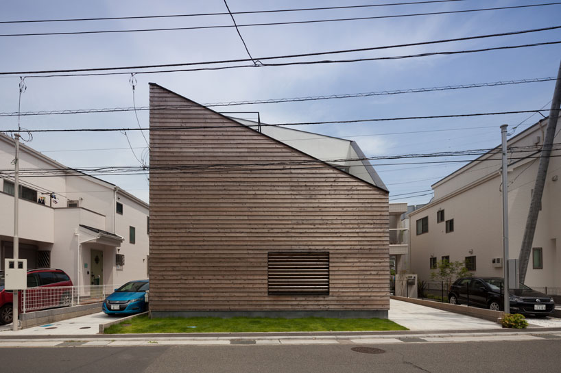 level architects' house in ofuna sports a deeply angled roofline