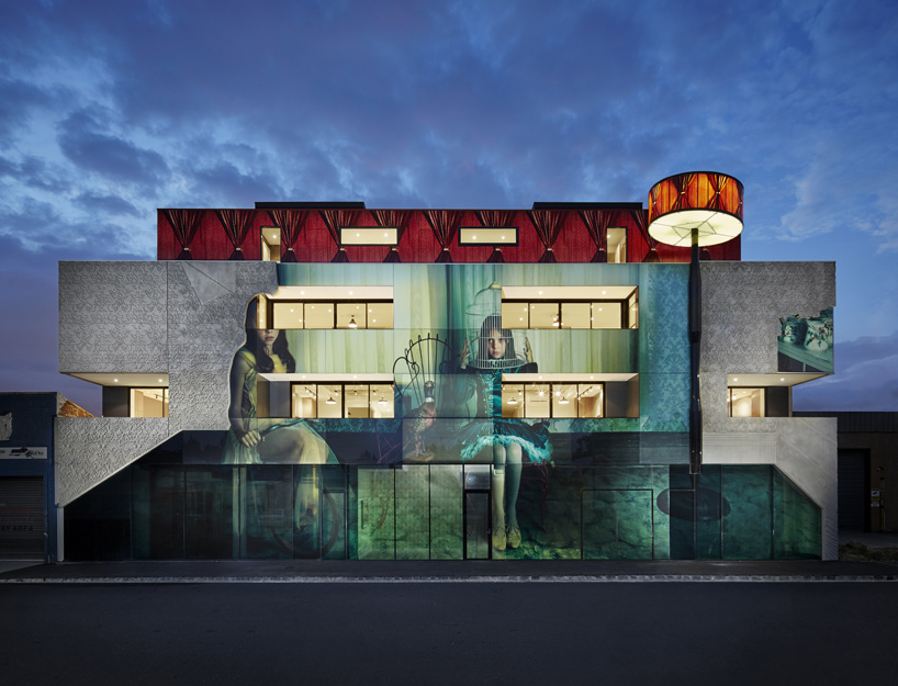 melbourne's 2 girls building spans a photographic skin along its façade