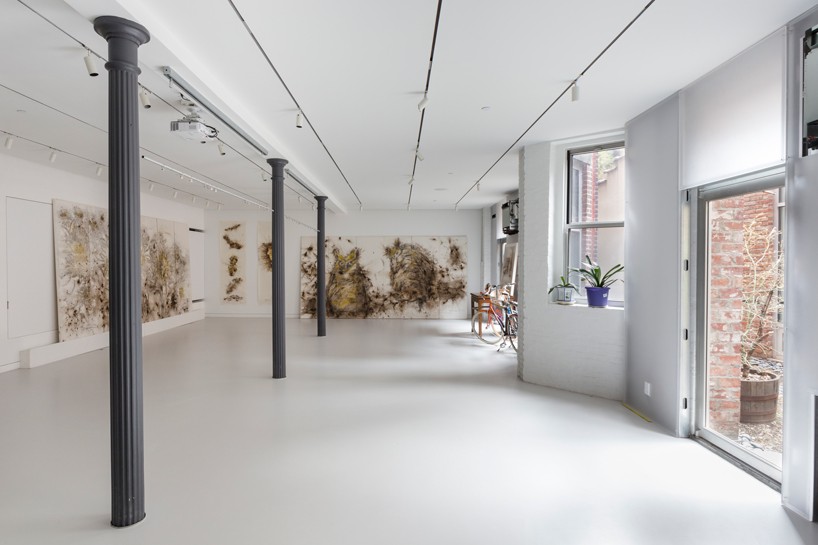 OMA juxtaposes old and new with artist cai guo-qiang's studio renovation