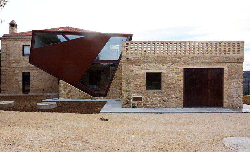 rocco valentini restores 19th century home with corten addition