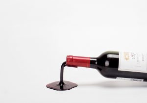 'fall in wine' wine holder expresses the moment of pouring | designboom ...