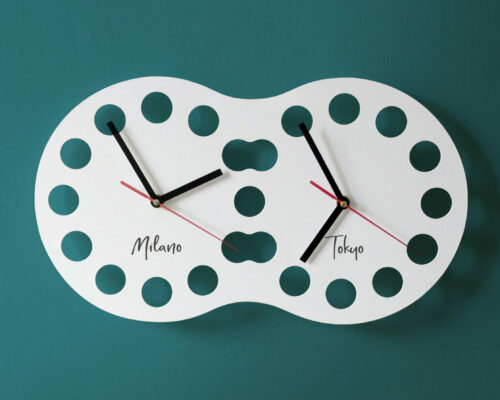 jetlag wall clock is a single dial watch that is laser-carved but has two distinct mechanisms