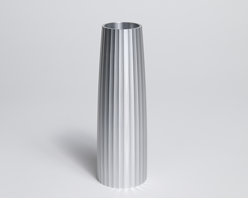 OOPARTS-002, a vase carved out of an aluminum cylinder