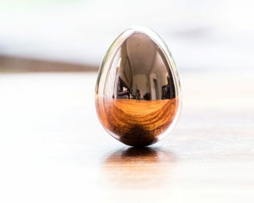 Brass Egg: Symbol of hope and purity, handcrafted in England.