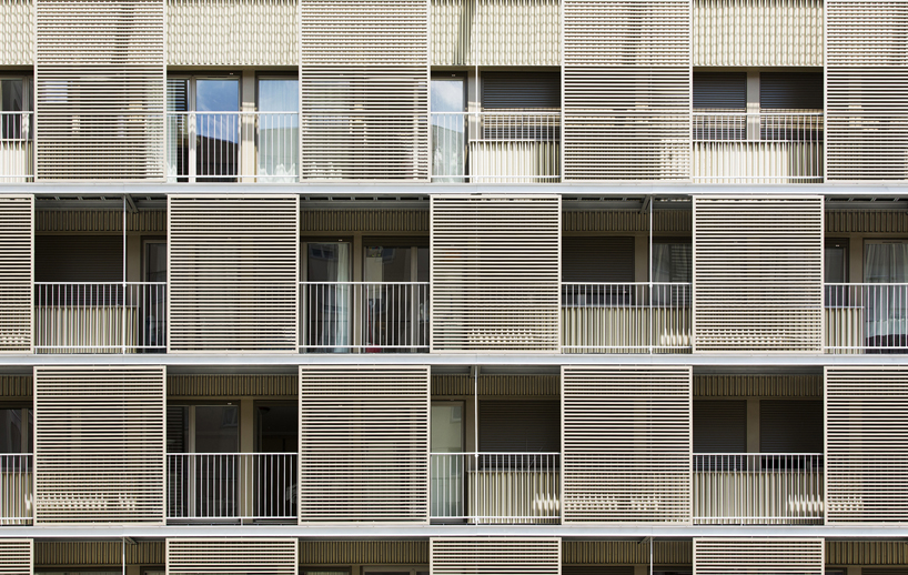 atelier du pont revitalize social housing block with new façade