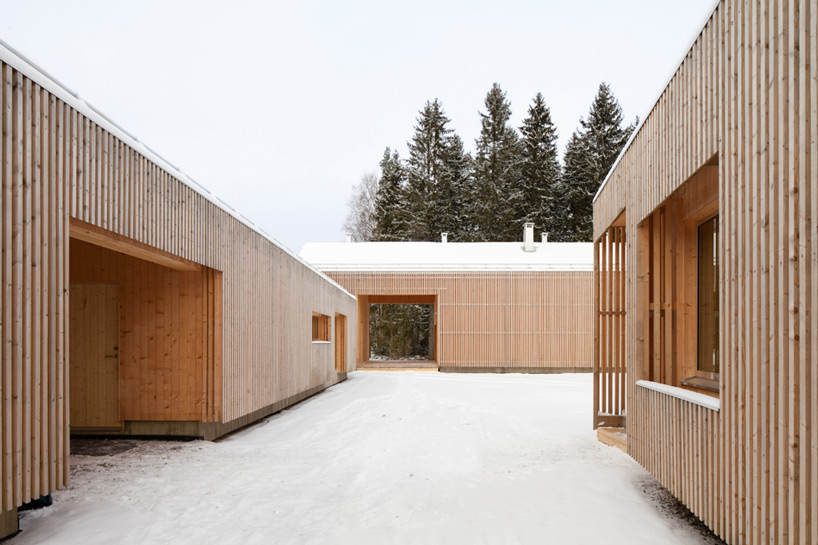 OOPEAA arranges house riihi around courtyard in finnish countryside