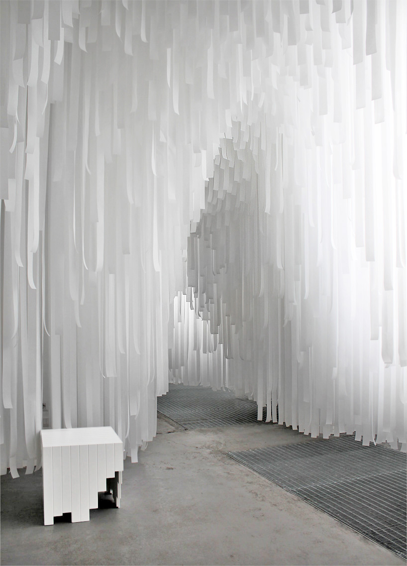 COS x snarkitecture turn milan's spazio erbe into a cavernous fabric ...
