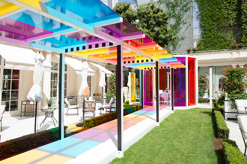 daniel buren creates a chromatic landscape in the gardens of hotel le ...