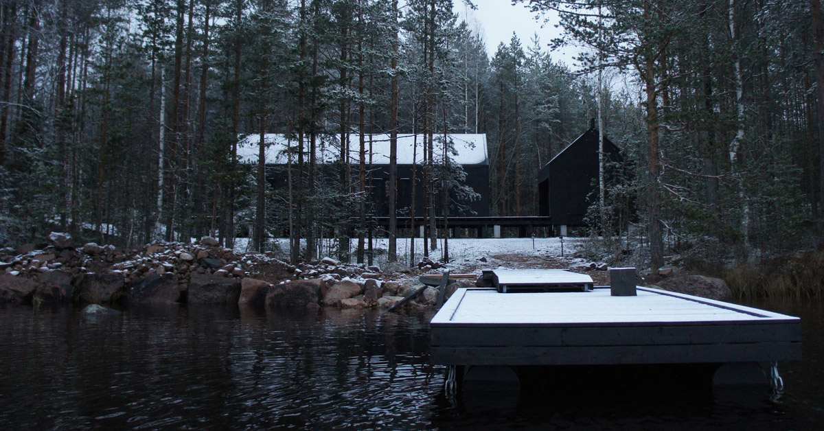 carla gertz embeds mökki santara cabin into the finnish wilderness