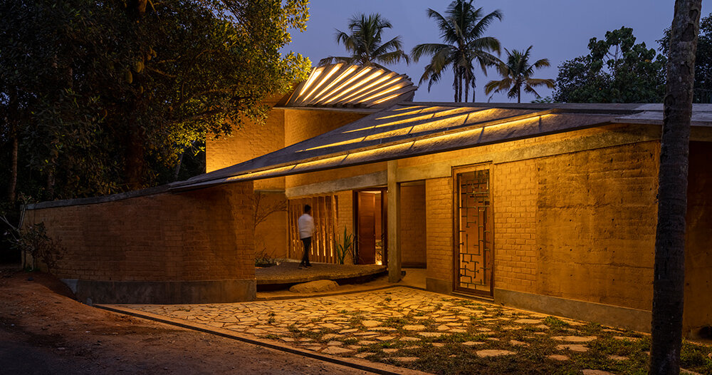 wallmakers designs its jackfruit garden residence with a twisting surface