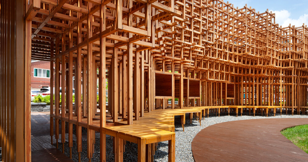 the modular 'forest pavilion' by IDS is a blurred timber cloud in south ...