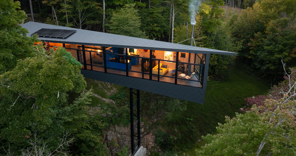 kariouk architects perches its m.o.r.e cabin atop stilts over canadian forests