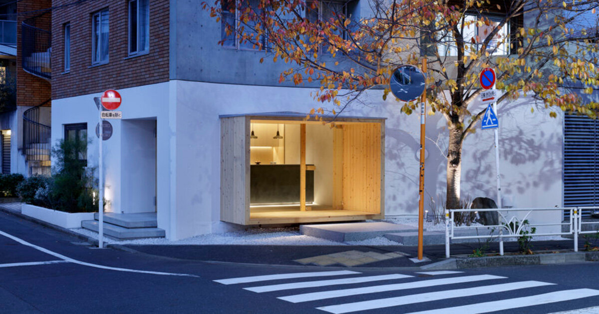 illuminated-pastry-shop-in-tokyo-peeps-out-of-extruded-wooden-frame