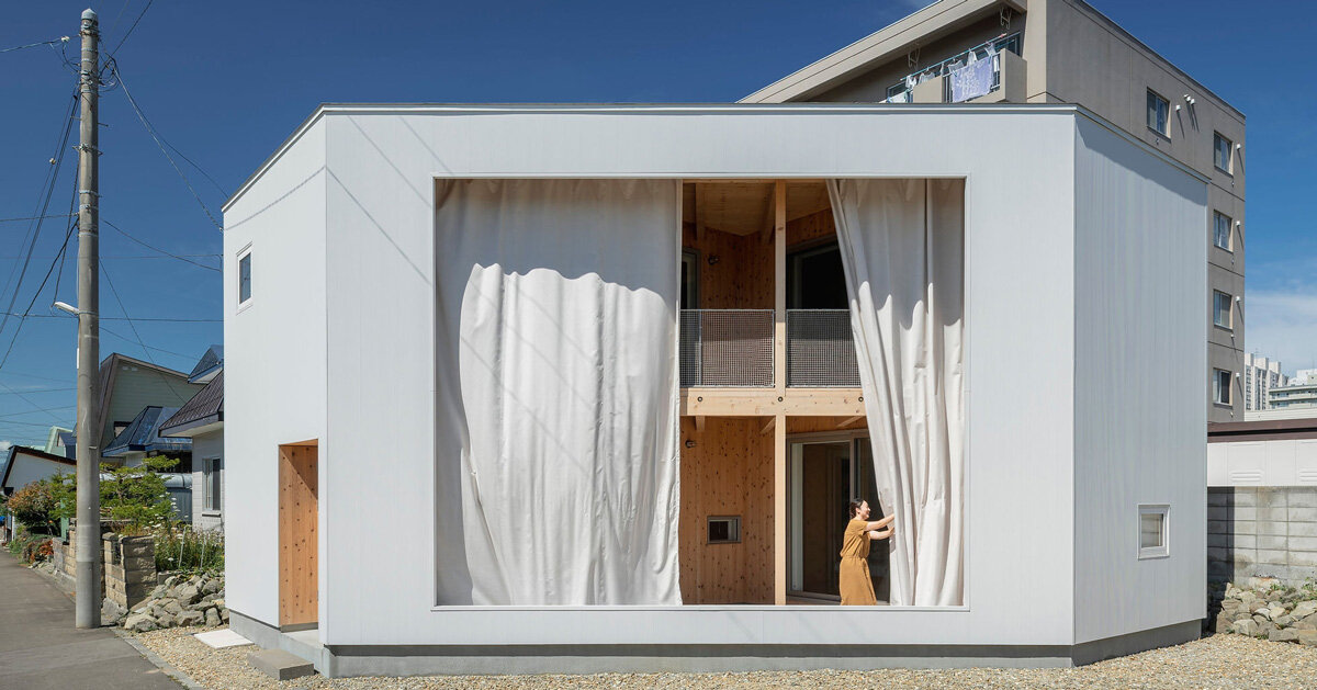 curtain wall encloses qukan's japan home's semi-external spaces