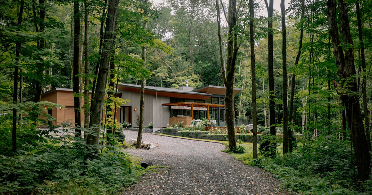 alternating single-slope roofs top oakhill house nestled in canada