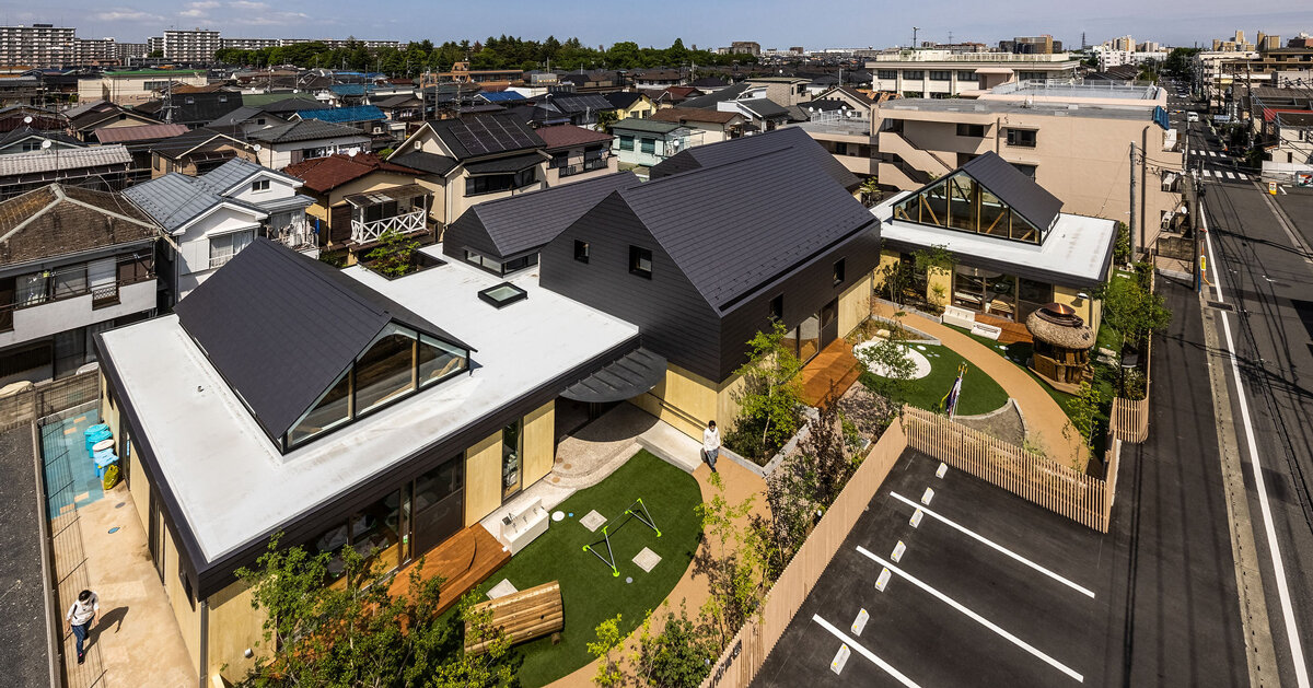 five wooden house-shaped volumes compose nursery school in tokyo