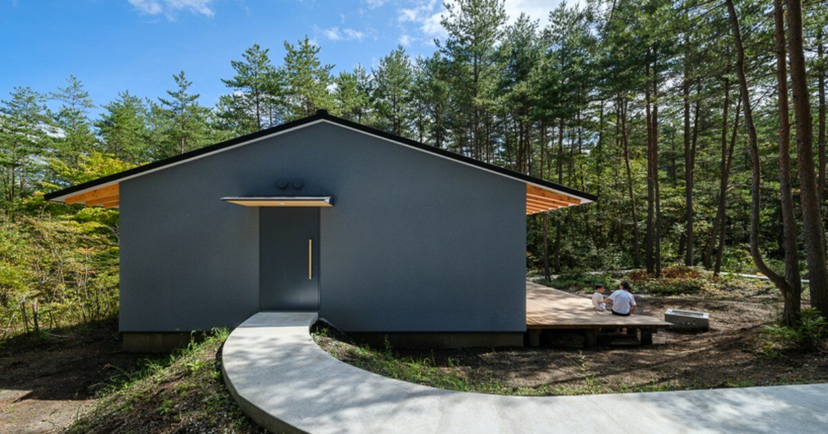 nature infused corridor cuts YSLA architects' forest retreat in japan