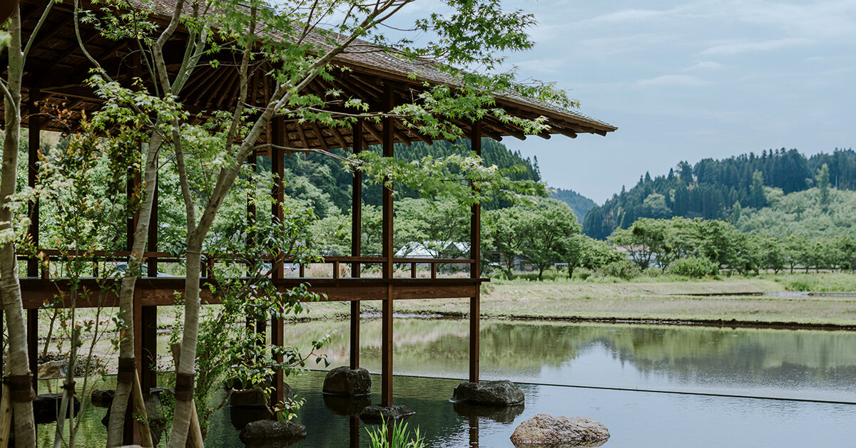 toru shimokawa utilizes ancient traditional wood for rustic café takenokuma in japan