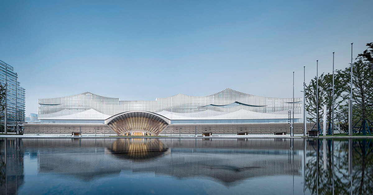 changsha conference center's facade by SCAD employs perforated metal panels