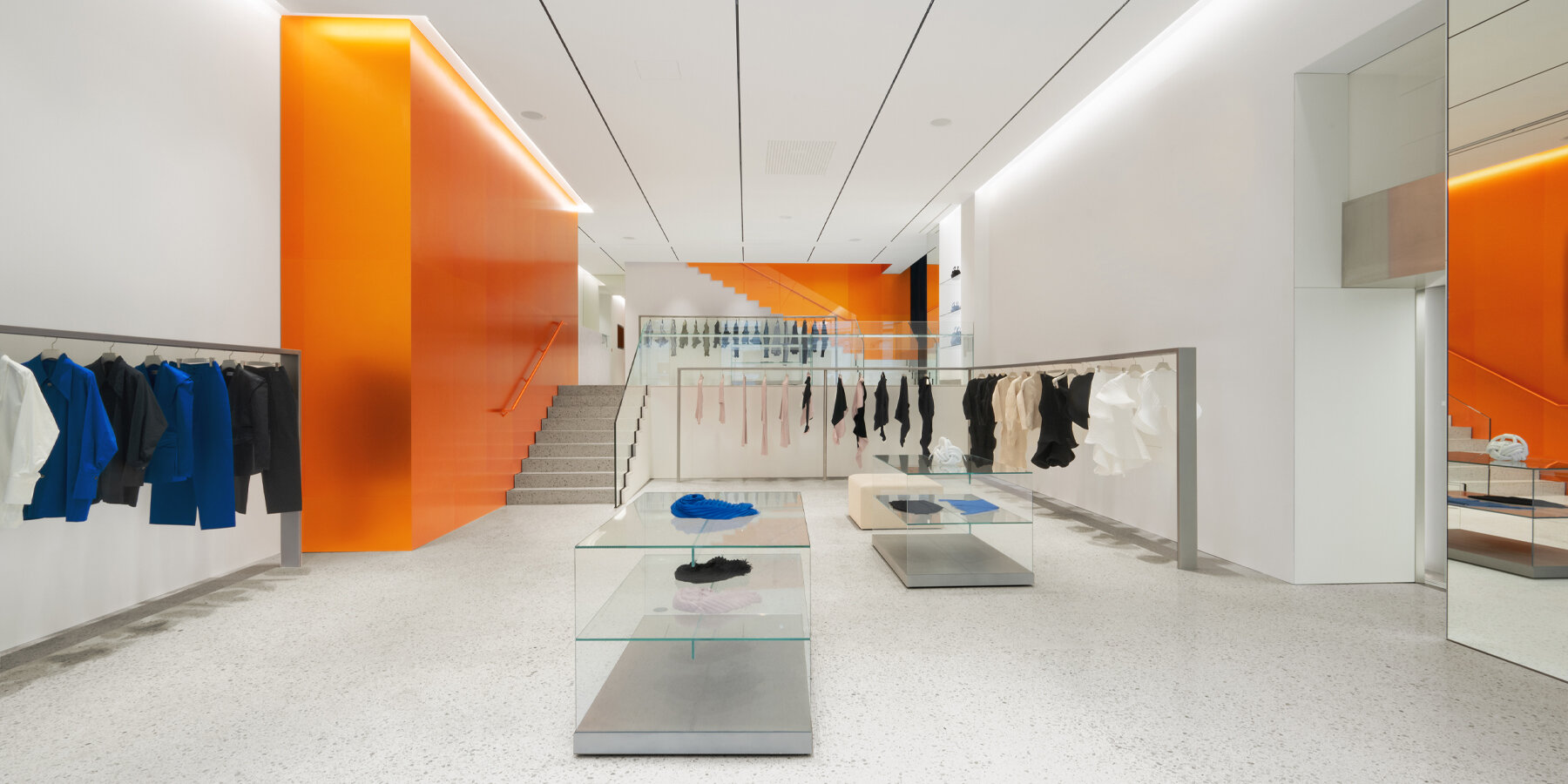 orange aluminum walls light up issey miyake's flagship in paris