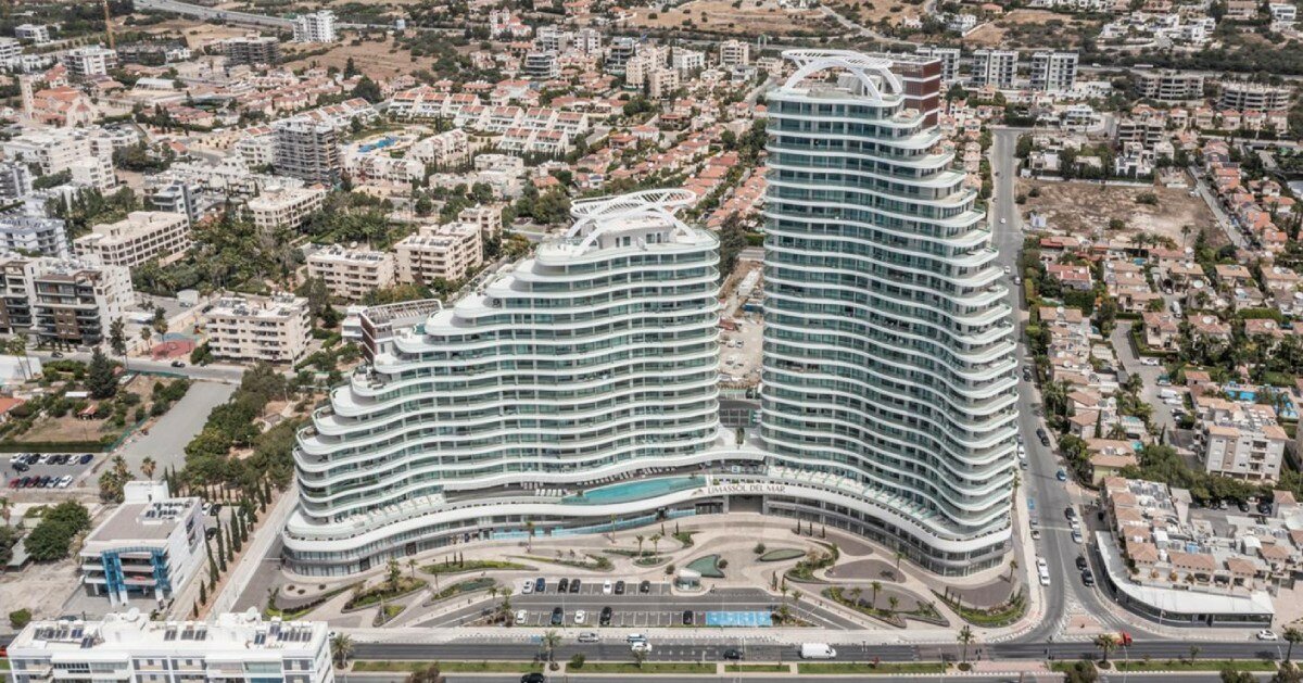 rippling ship-like volumes unite luxury commercial and residential spaces at limassol seafront