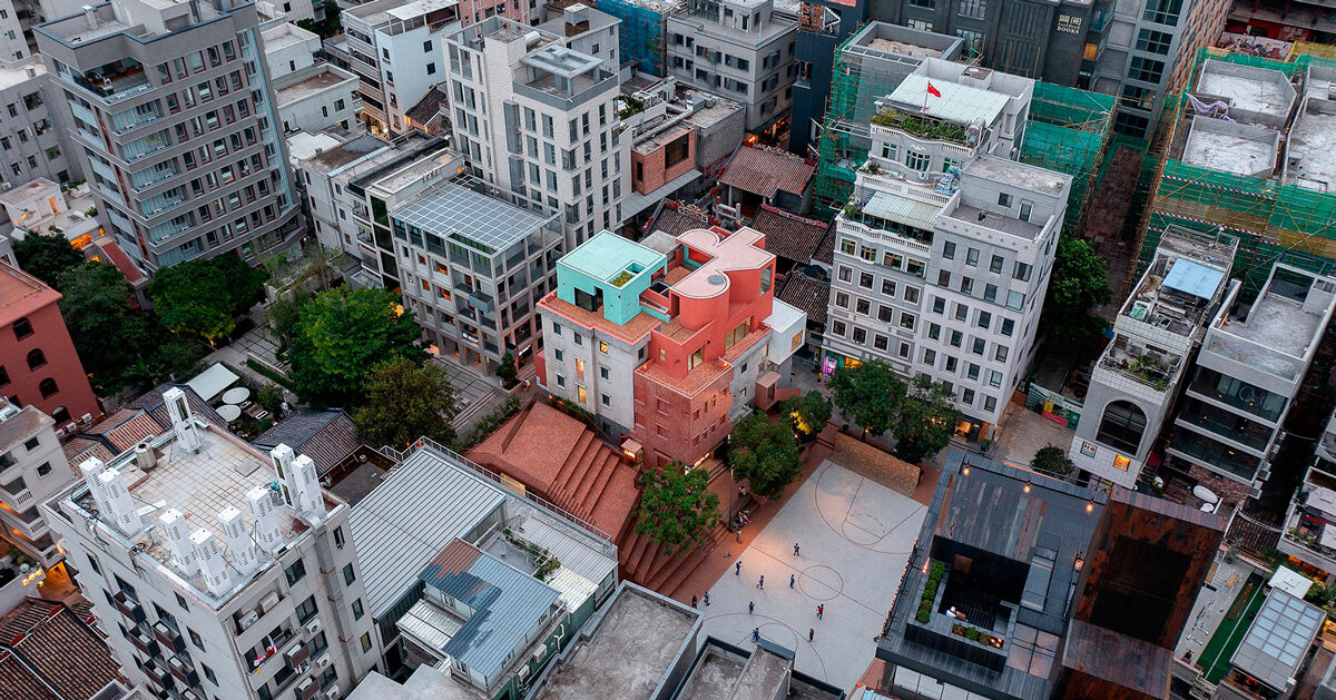 colorful geometric volumes by URBANUS extend atop old building in china