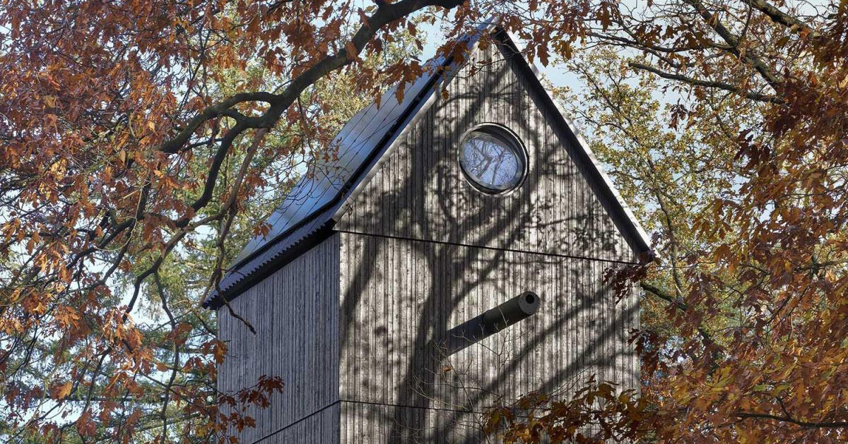 shaped like a bird house, i29 architects’ forest folly hides amid treetops in the netherlands