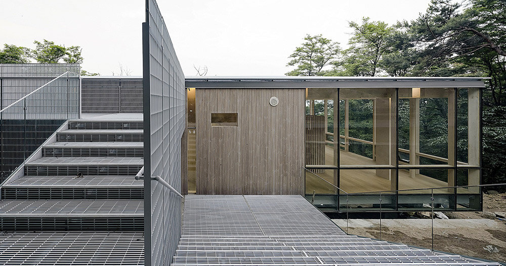 former guard post on south korea’s inwang mountain becomes modern forest retreat