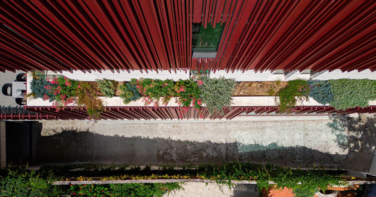 red timber-clad skin covers the Art Nouveau façade of the parking garage in Aveiro