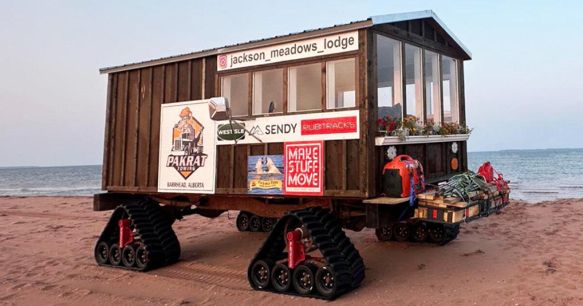 Mobile small house on rails “Rubihack” drives on hills, sand and water for camping in the vehicle