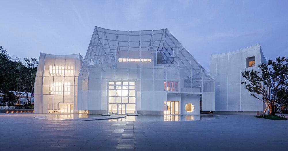 The flickering summit gallery of the wutopia lab is a trio of glowing “mountains”