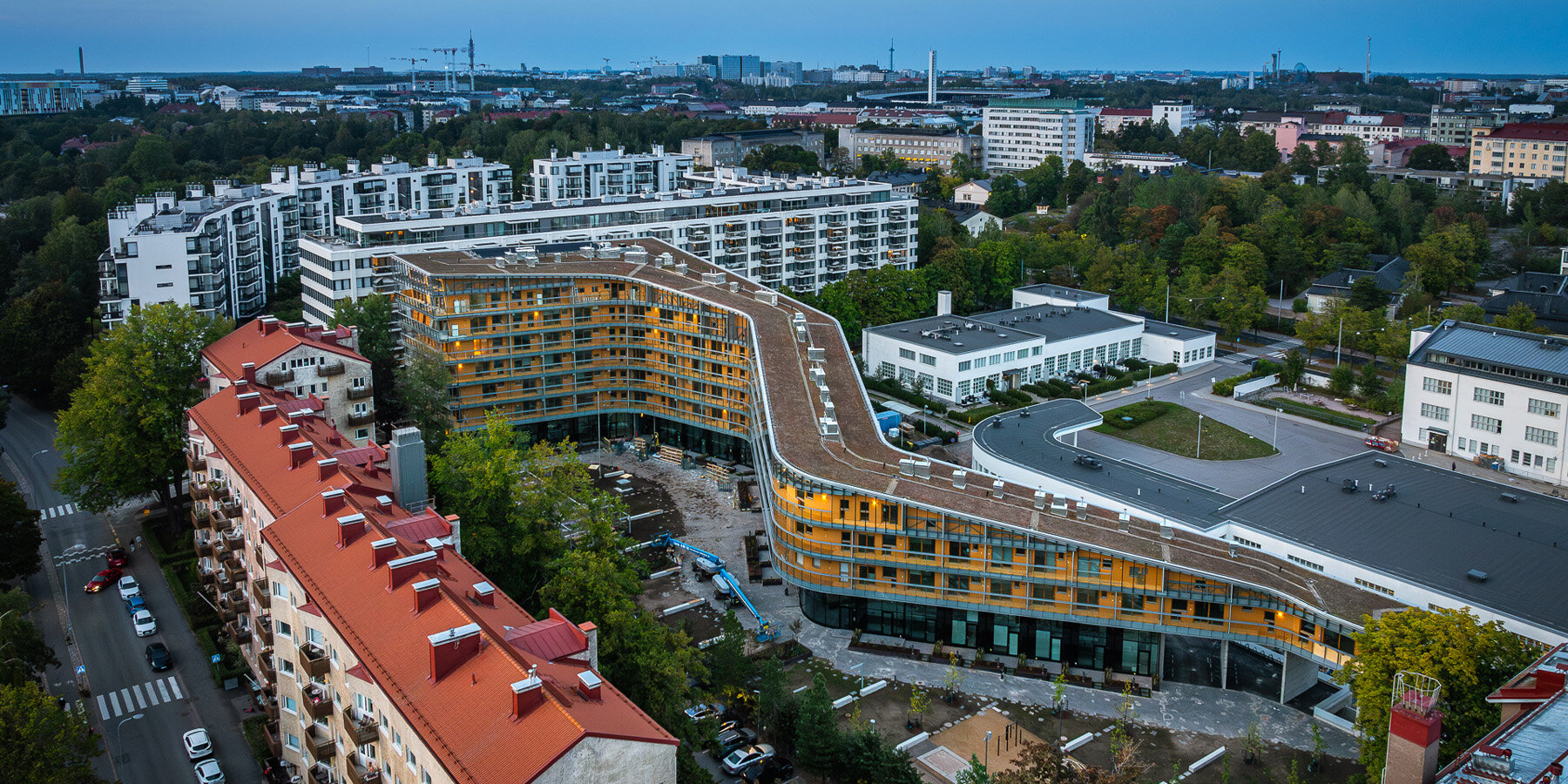 glass-wrapped meander house by steven holl marks grand opening at helsinki design week